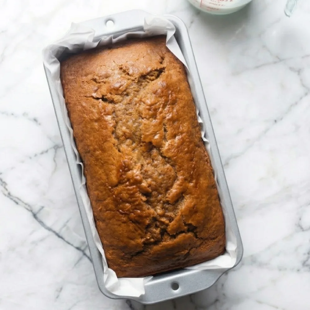 Freshly baked carrot cake loaf in pan